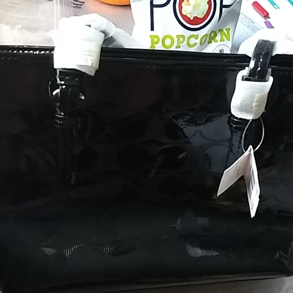 Coach Peyton linear embossed top handle tote